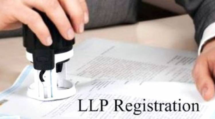 How do I convert a LLP to a holding company in India?